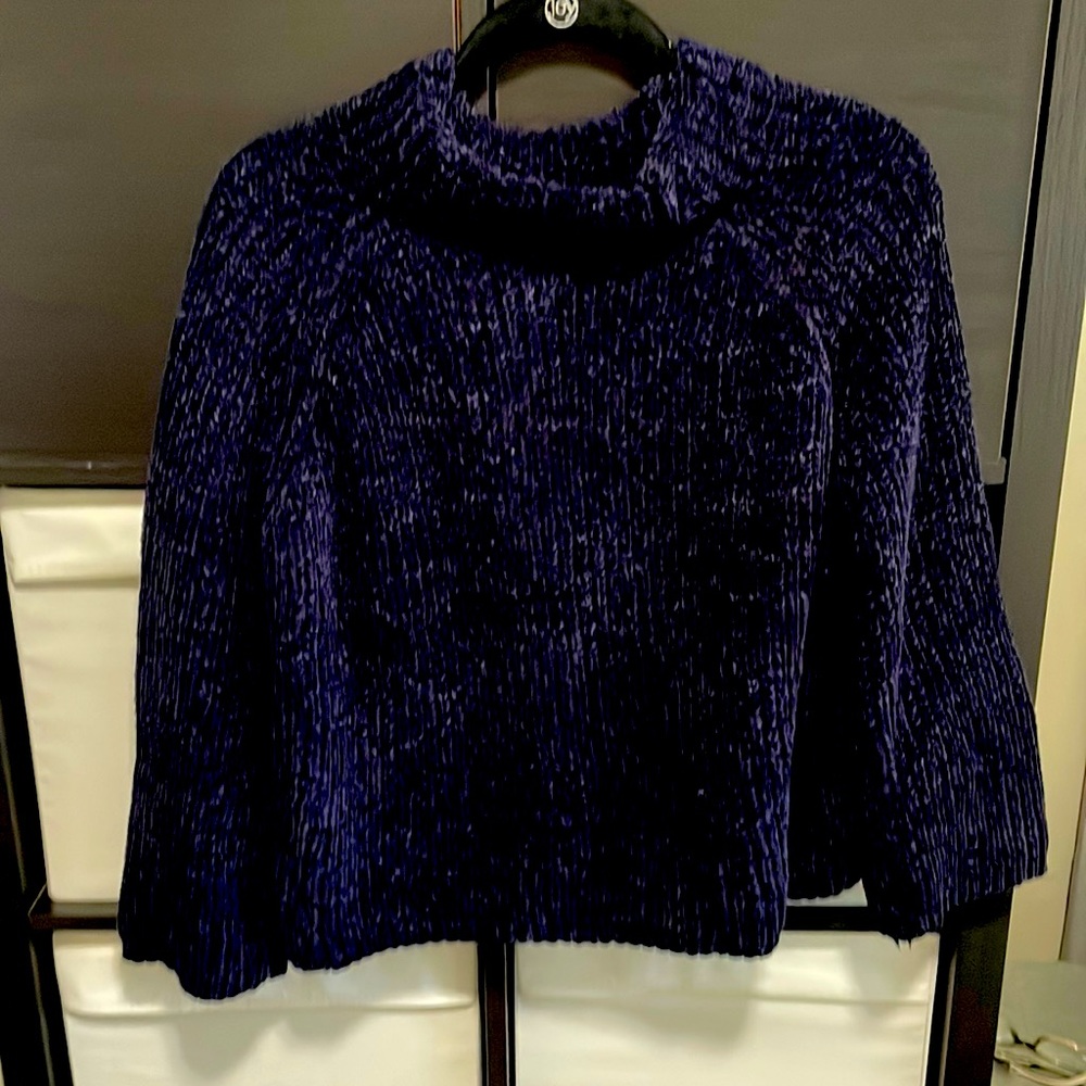 Navy sweater. Softest material ever!!! Cute subtle flare sleeve.
